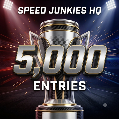 Promotional graphic with a large metallic trophy centered on a dark racing-style background, with the text 'SPEED JUNKIES HQ' at the top and '5,000 ENTRIES' over the trophy.