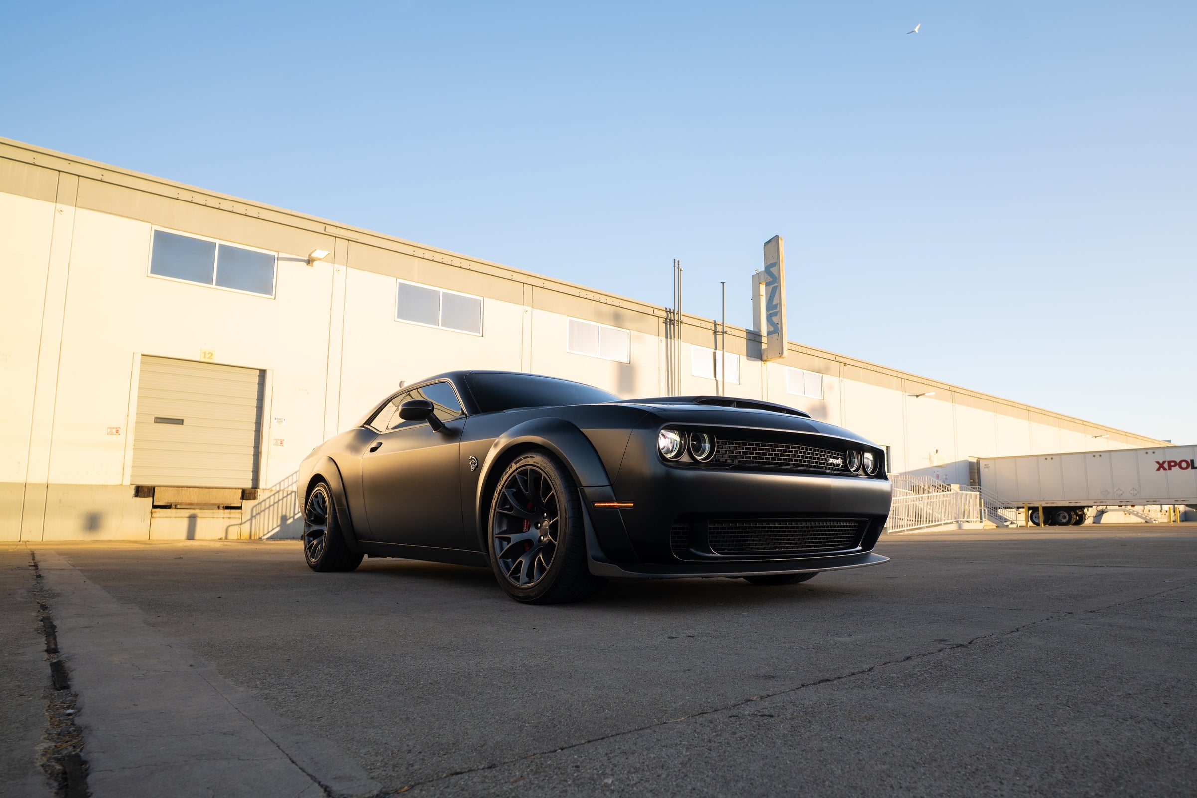 Matte black widebody Dodge Challenger SRT Hellcat — the current Speed Junkies HQ giveaway car