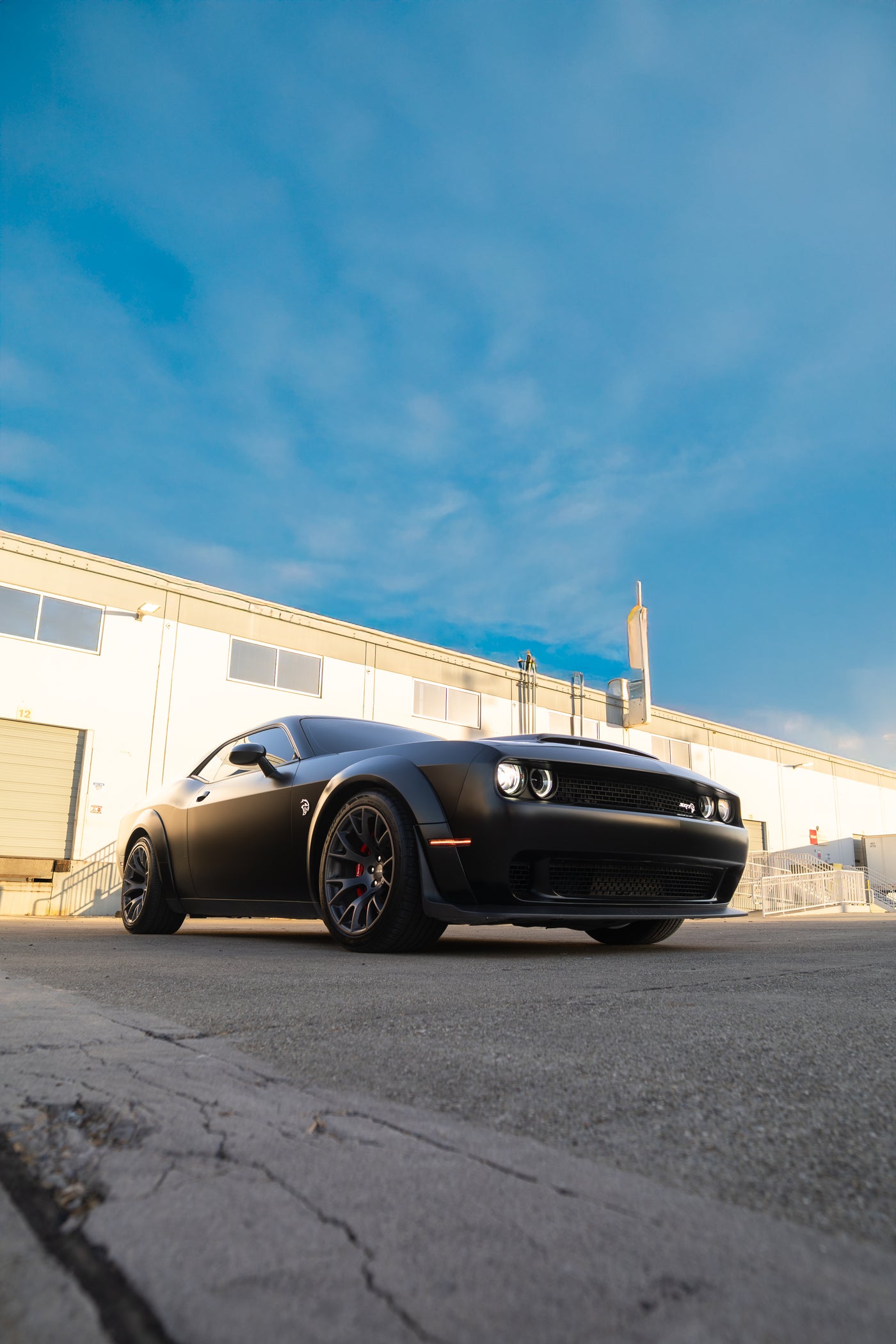 Matte black widebody Dodge Challenger SRT Hellcat — the current Speed Junkies HQ giveaway car
