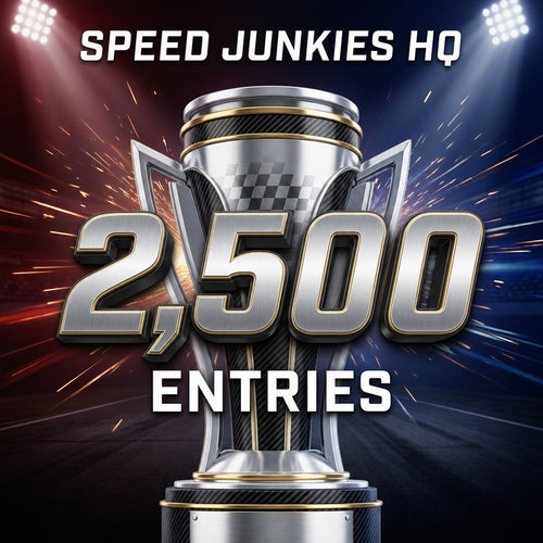 Promotional graphic for a speed event or competition with a metallic trophy centered on a dark racing-stadium background. Large text reads 'SPEED JUNKIES HQ' at the top and '2,500 ENTRIES' over the trophy.